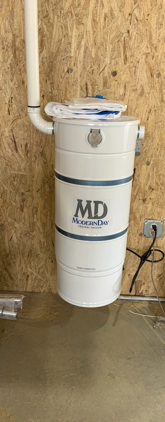 Installed Modern Day central vacuum power unit in residential construction